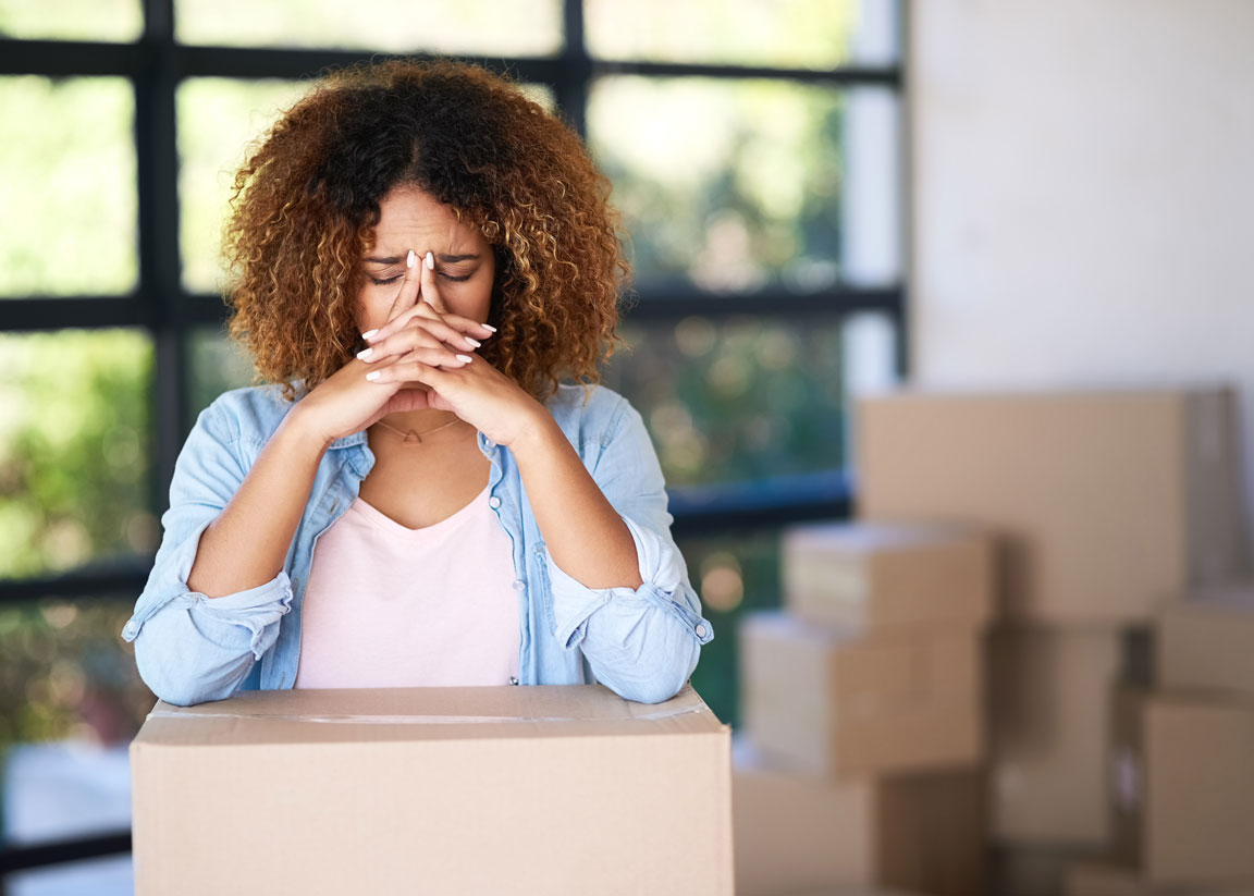 woman moving with boxes