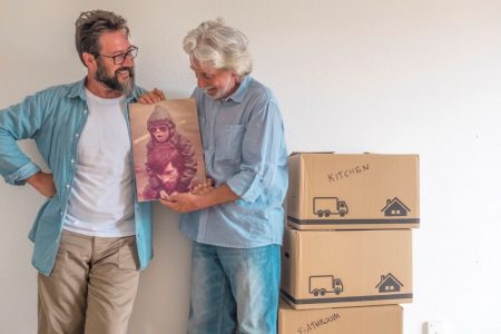 SCS Feature senior-father-and-mature-son-in-empty-apartment-wi-2024-11-02-23-32-20-utc Family moving out
