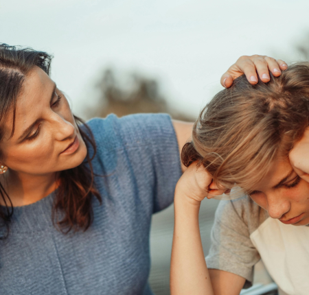 mom-talking-to-son-about-feelings mom comforting son