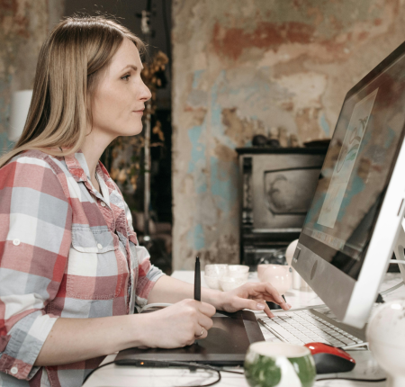 woman-working-on-computer woman working at desk on computer